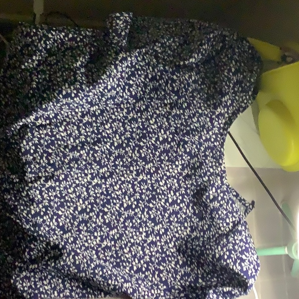 a cute, floral top for kids for size 10-11. its blue with white design, Shein.